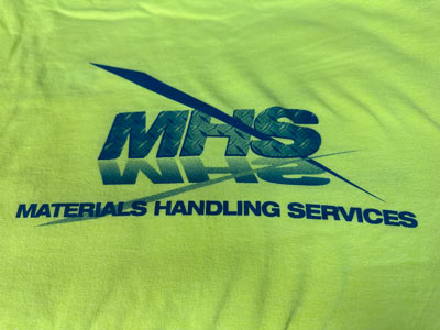 Logo of Materials Handling Services (MHS) embroidered on lime green fabric.